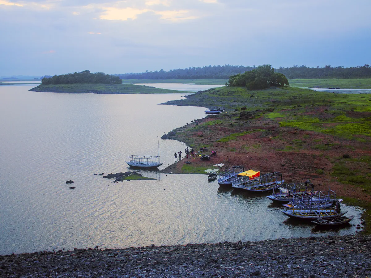 Boats moored at the Mukutmanipur Dam reservoir