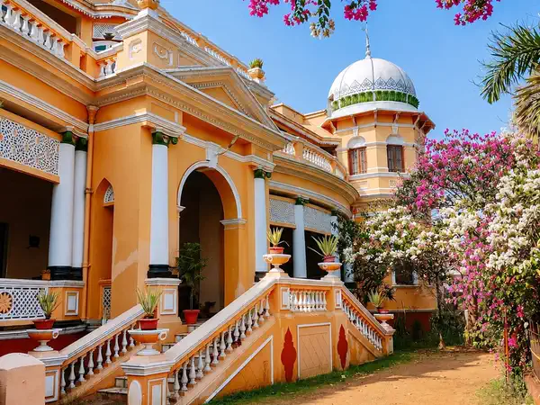 Jhargram Rajbari palace with bougainvillea in bloom