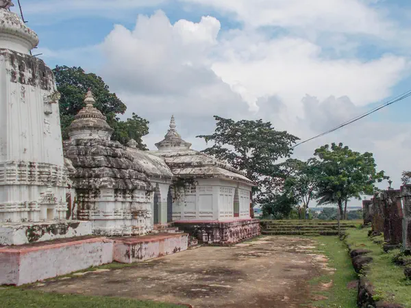 White temple shrines and courtyard at Rameshwar