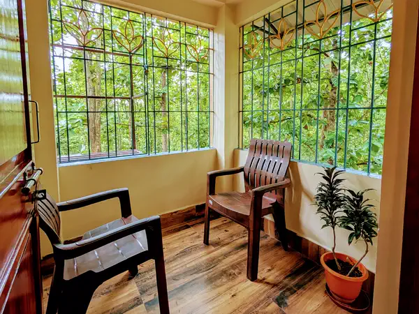 Sit-out with forest views at the super deluxe room